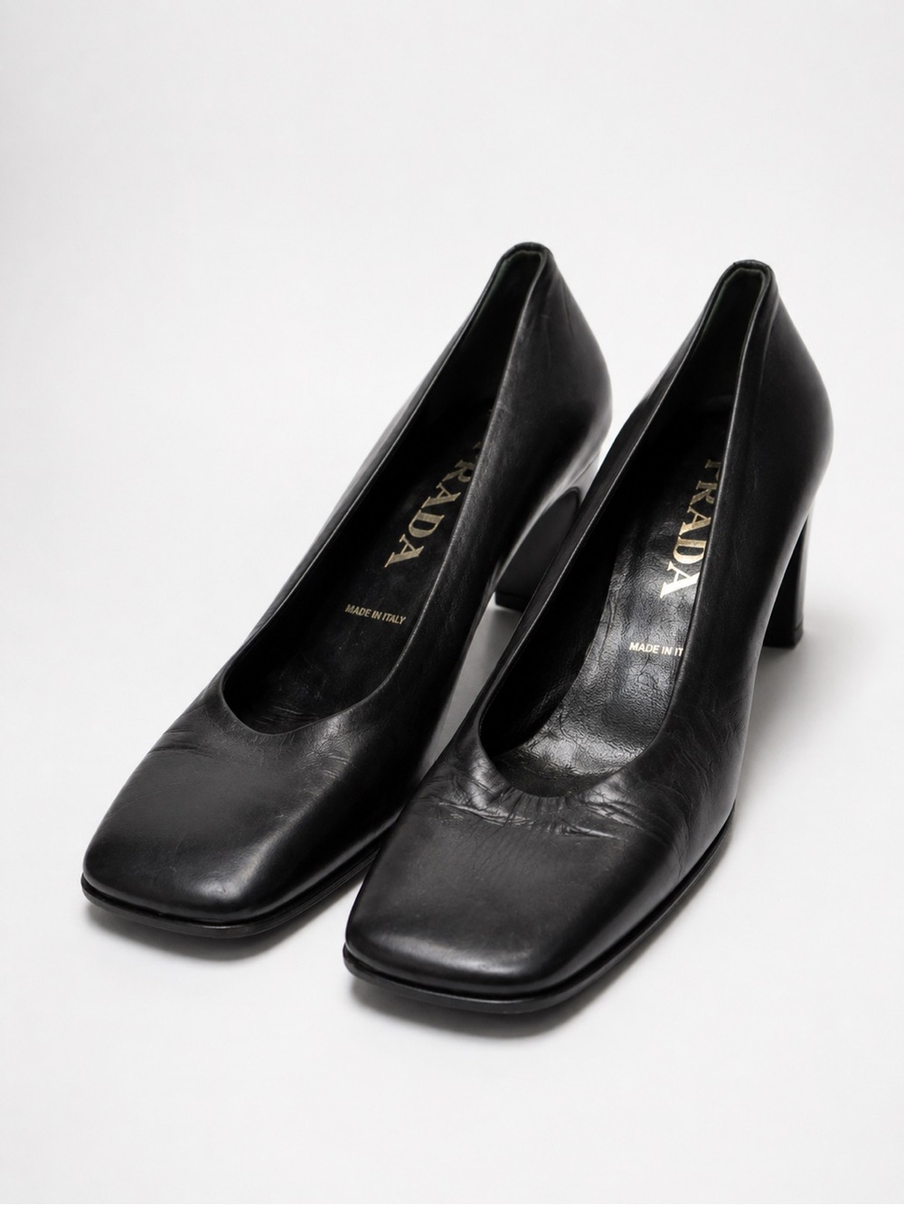 Prada Black Leather Square-Toe Block Heel Pumps with Gold Logo Insole